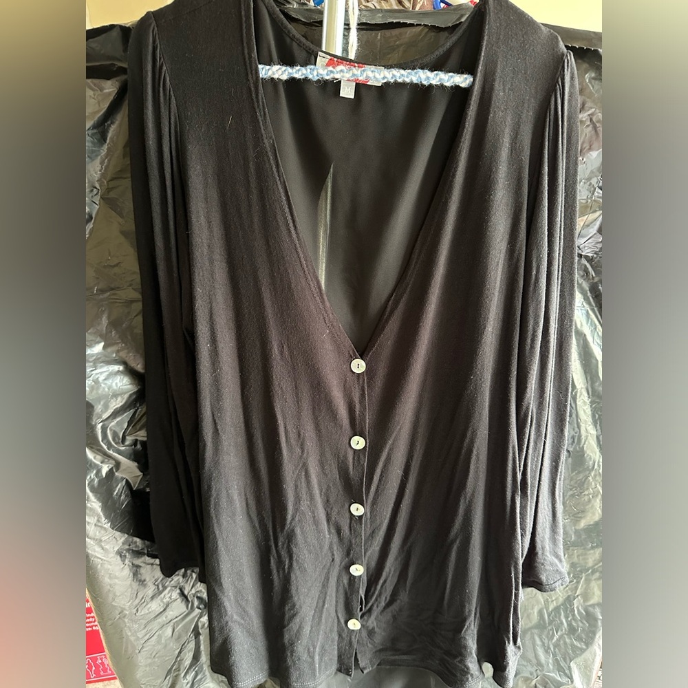 Top with sheer insert on back.  Boutique clothing  Med.